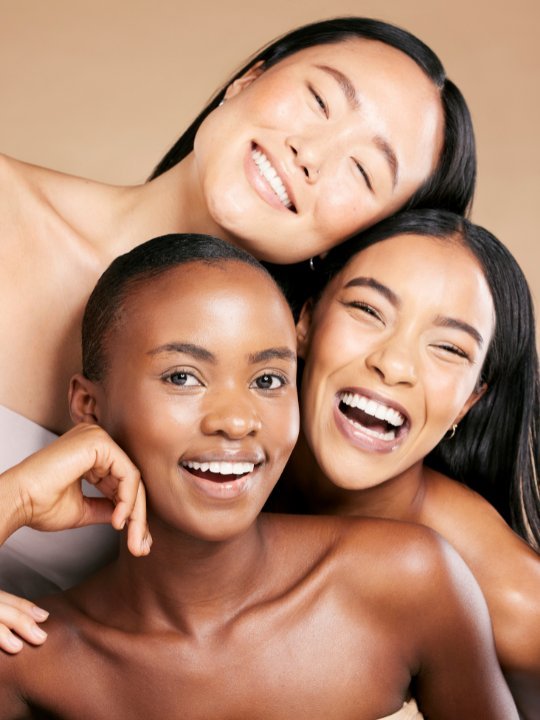Three models smiling